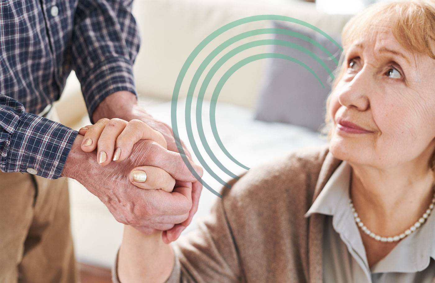 Elderly couple holding hands with CRC logo overlaid, signifying caregiver support and resources